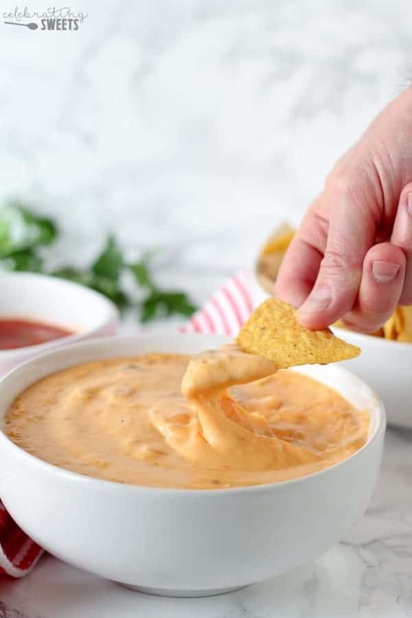 Queso dip and tortilla chips.