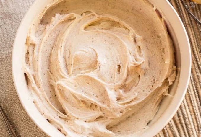 Chai-spiced buttercream in a white bowl.