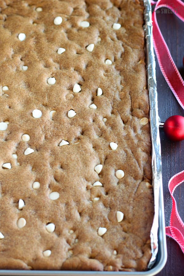 Gingerbread cookie bars with white chocolate chips.