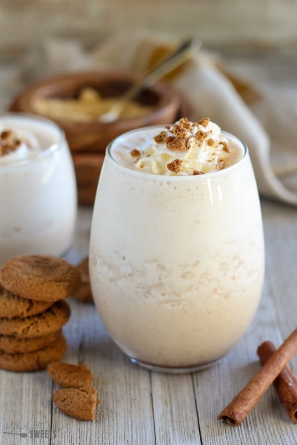 Gingerbread smoothie topped with whipped cream and crushed cookies. 