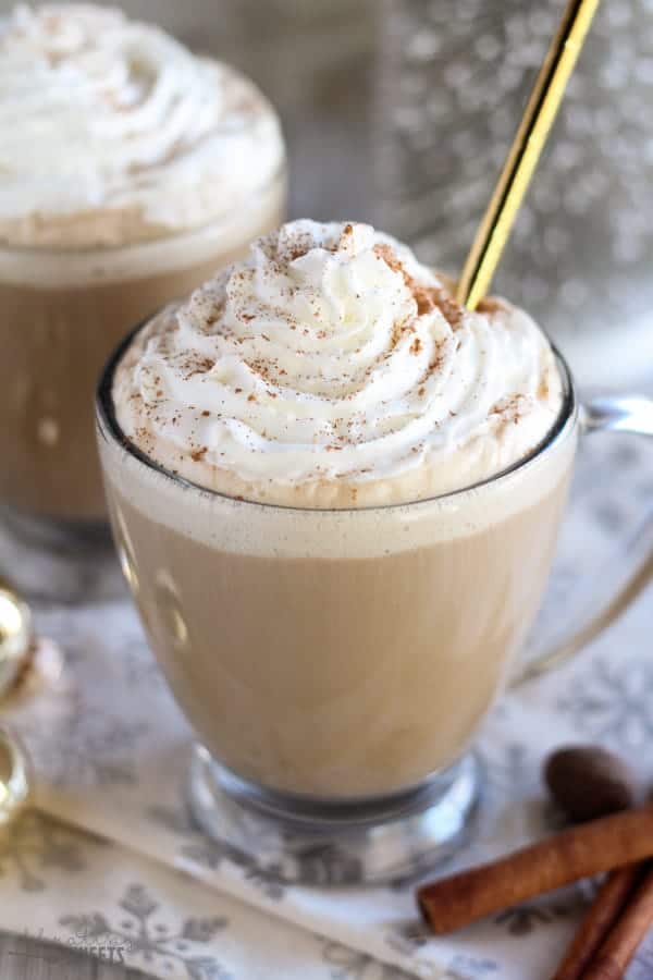 Eggnog latte topped with whipped cream.