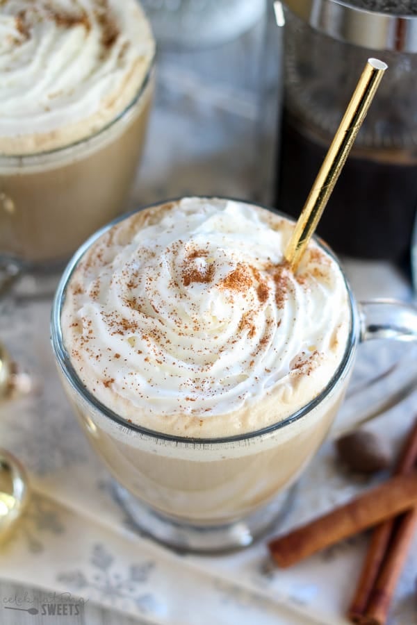 Eggnog latte topped with whipped cream.