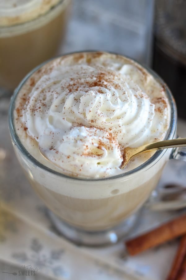 Eggnog latte topped with whipped cream.