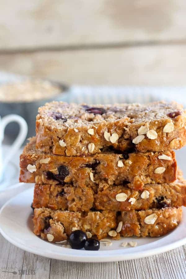 Stack of blueberry oatmeal bread.