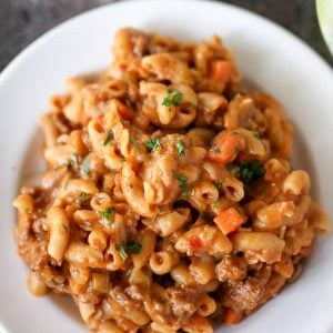 Macaroni casserole on a white plate.