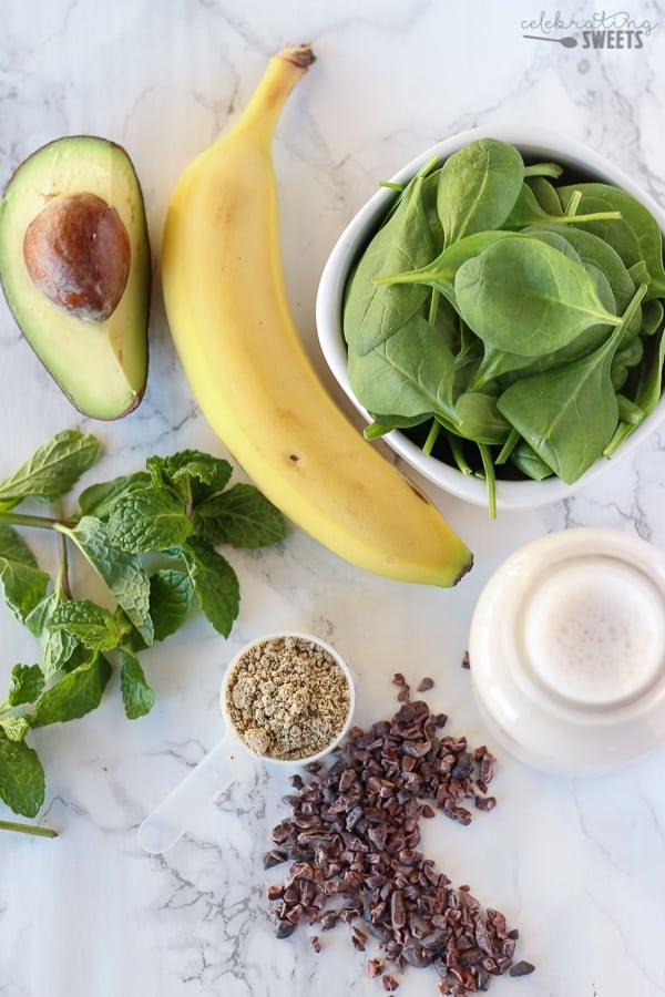 Ingredients for mint smoothie: spinach, banana, avocado, mint, milk.