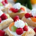 Mini tart topped with fruit.