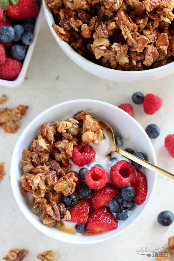 Bowl of granola with yogurt and berries. 
