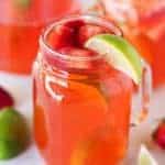 Strawberry Lime Shandy - A light and refreshing beer cocktail made with Corona Light, strawberry syrup and fresh lime juice. The perfect beverage for Cinco de Mayo or any spring or summer occasion!