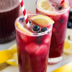 A close up of Blueberry Lemonade in a glass.