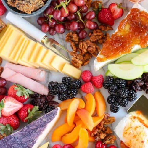 The BEST Fruit and Cheese Board Celebrating Sweets