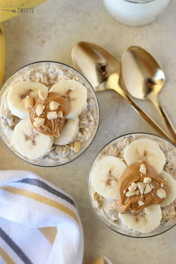 Overnight oats with peanut butter and sliced banana in a glass.