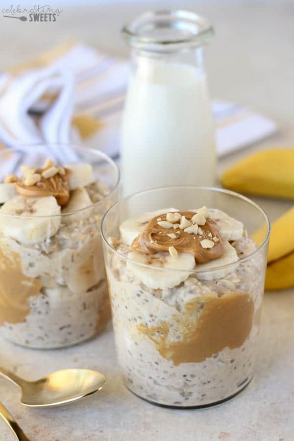 Overnight oats with peanut butter and sliced banana in a glass.