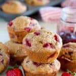 Strawberry Muffins - Moist and tender muffins filled with strawberry yogurt, fresh strawberries and strawberry jam. A wholesome breakfast to start your day!