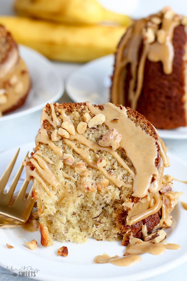 Slice of banana bundt cake with brown sugar glaze.