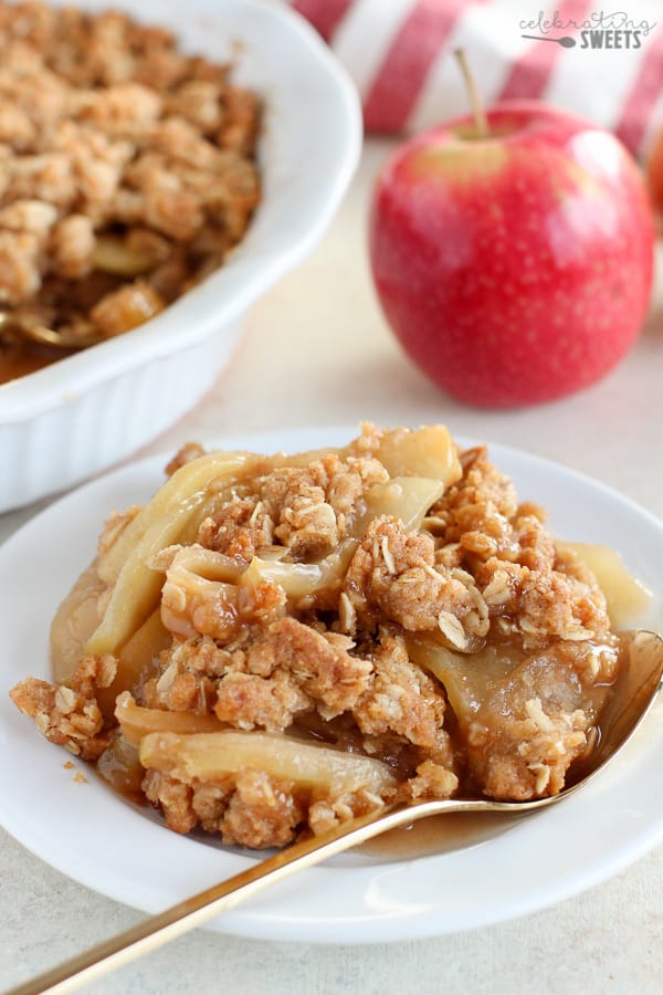 Apple Crisp with oat topping on a white plate.