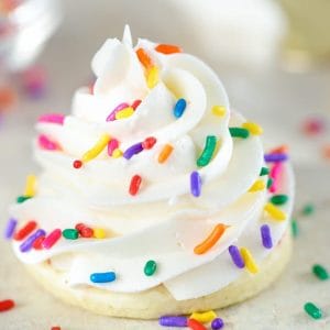 Swirl of Vanilla Buttercream Frosting topped with sprinkles.
