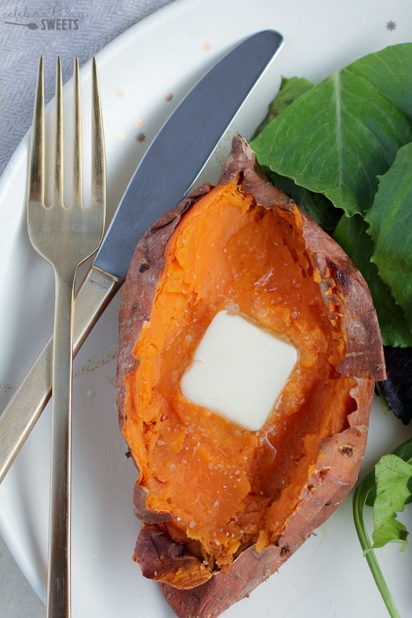 Baked Sweet Potato and Salad on a plate.