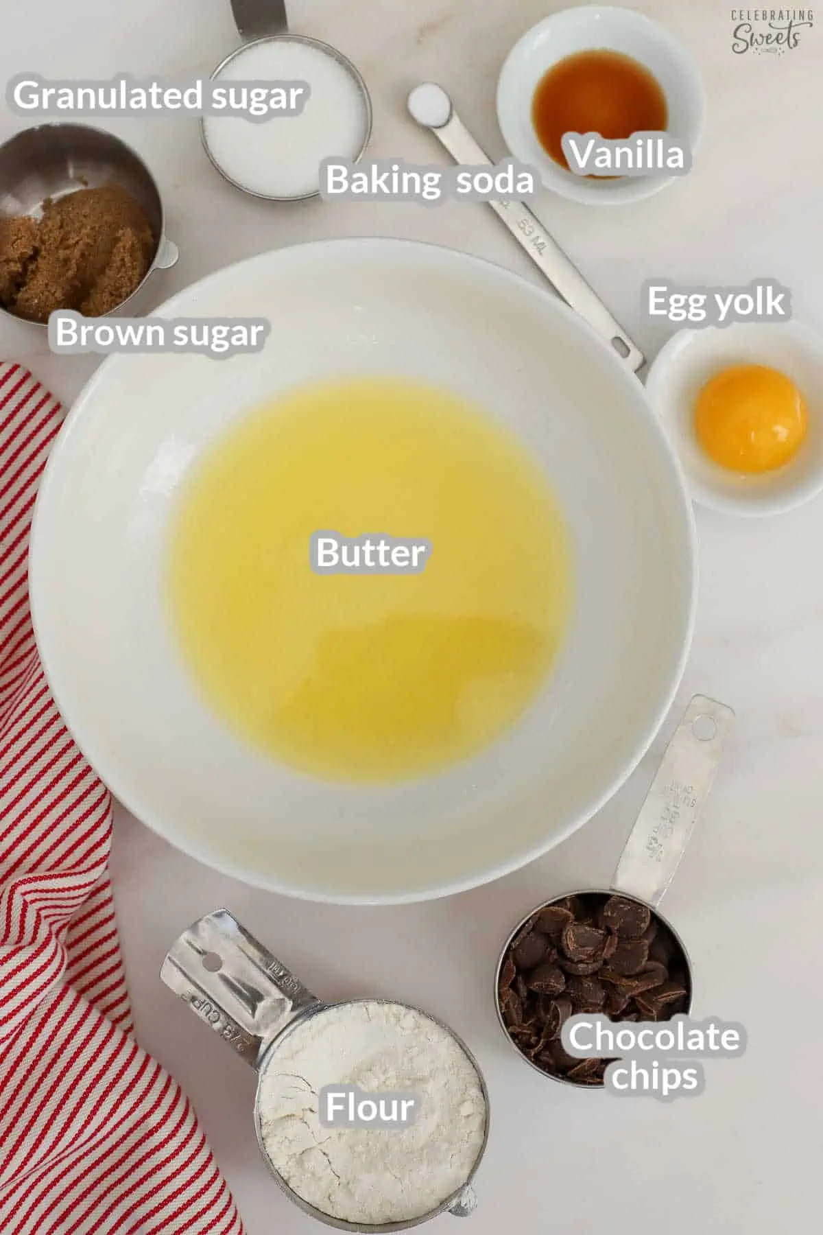 Ingredients for chocolate chip cookies: butter, sugar, flour, egg, chocolate chips. vanilla