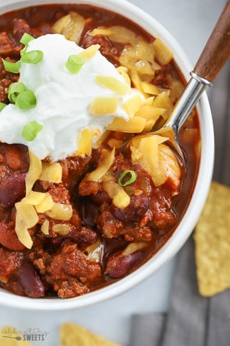 Beef Chili topped with cheese, sour cream and green onion