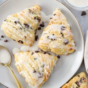 Plate with three chocolate chip scones.