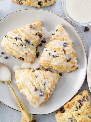 Plate with three chocolate chip scones.