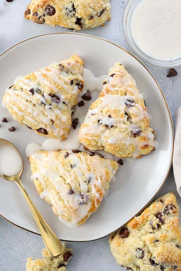 Plate with three chocolate chip scones.