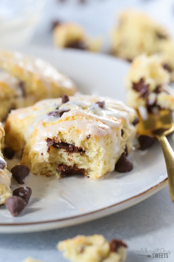 Inside of a chocolate chip scone on a white plate.