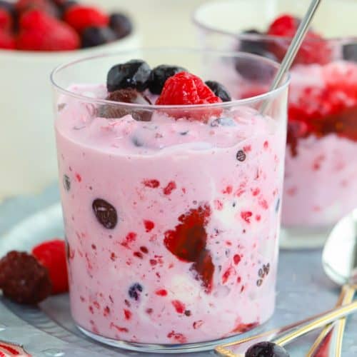 Berries mashed with ice cream in a glass.