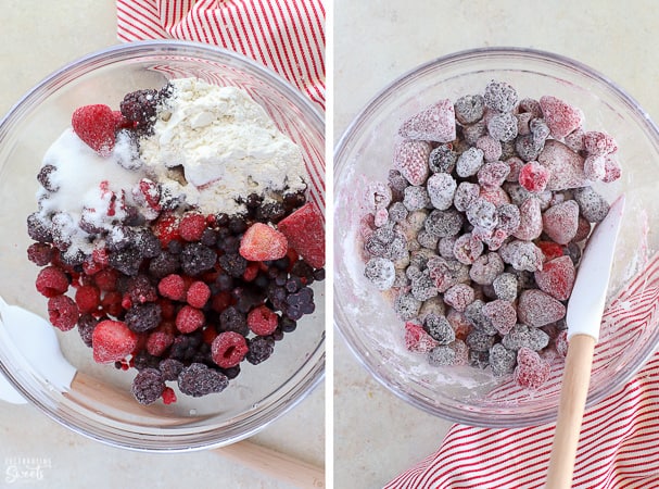 Frozen berries with sugar and flour in a glass bowl. 