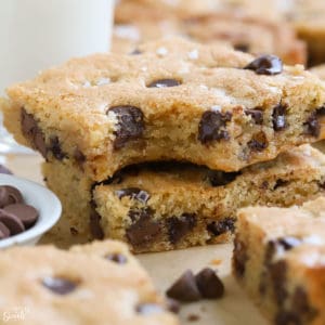 Two chocolate chip cookie bars stacked on top of each other.