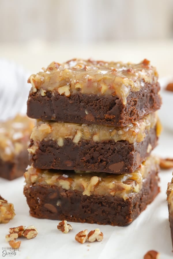Stack of brownies with pecan topping
