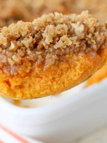 Sweet potato souffle on a large spoon