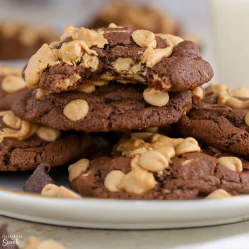 Chocolate peanut butter cookies piled on a plate.