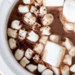 Hot Chocolate in a crock pot topped with marshmallows