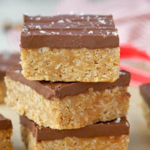 Stack of three cereal bars topped with chocolate