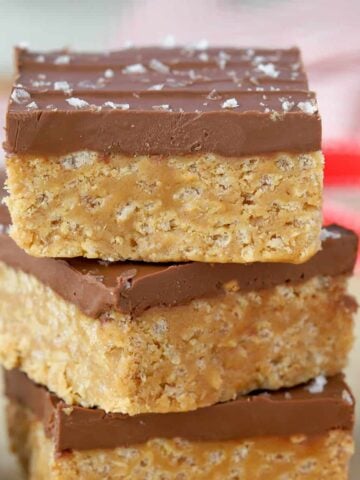 Stack of three cereal bars topped with chocolate