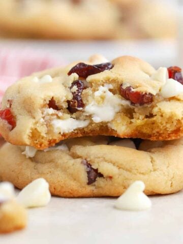 Stack of two white chocolate cranberry cookies