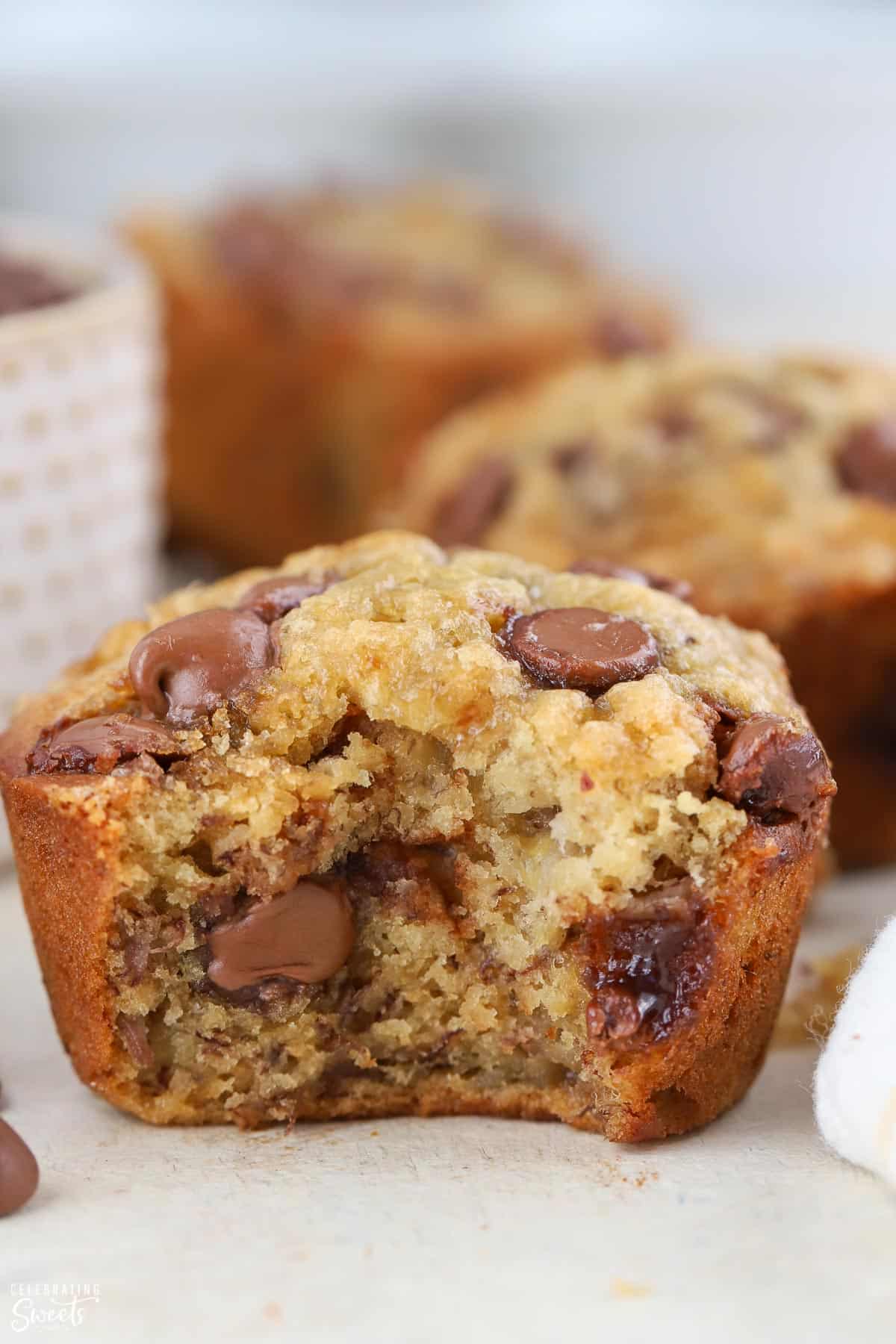 Close up of Banana Chocolate Chip Muffin with a bite taken out of it