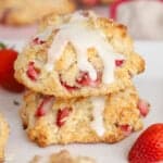 Two strawberry biscuits stacked on top of each other.