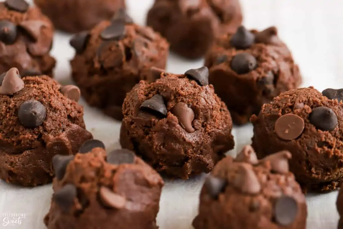 Chocolate cookie dough balls topped with chocolate chips