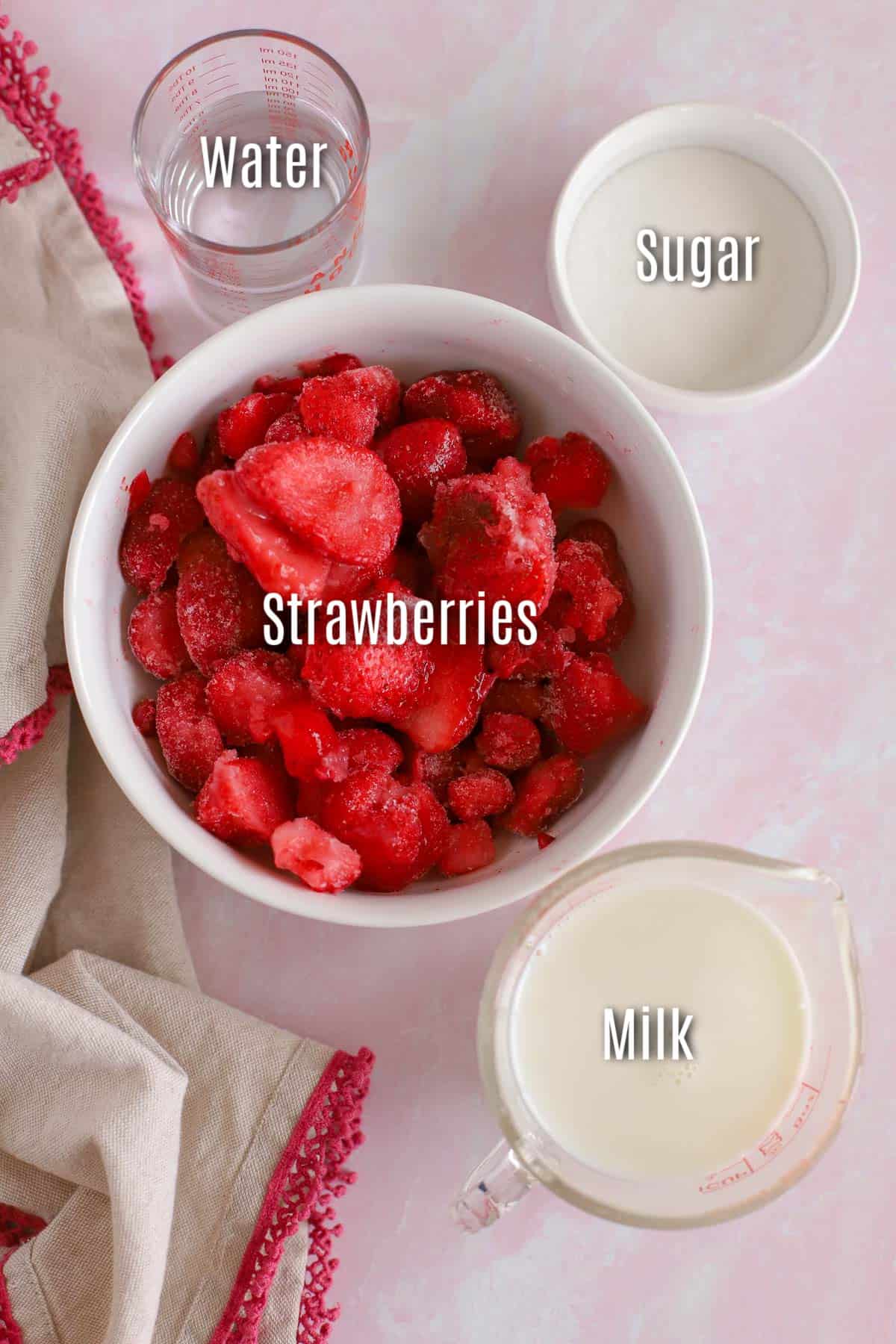 Ingredients to make strawberry milk: milk, strawberries, sugar, water