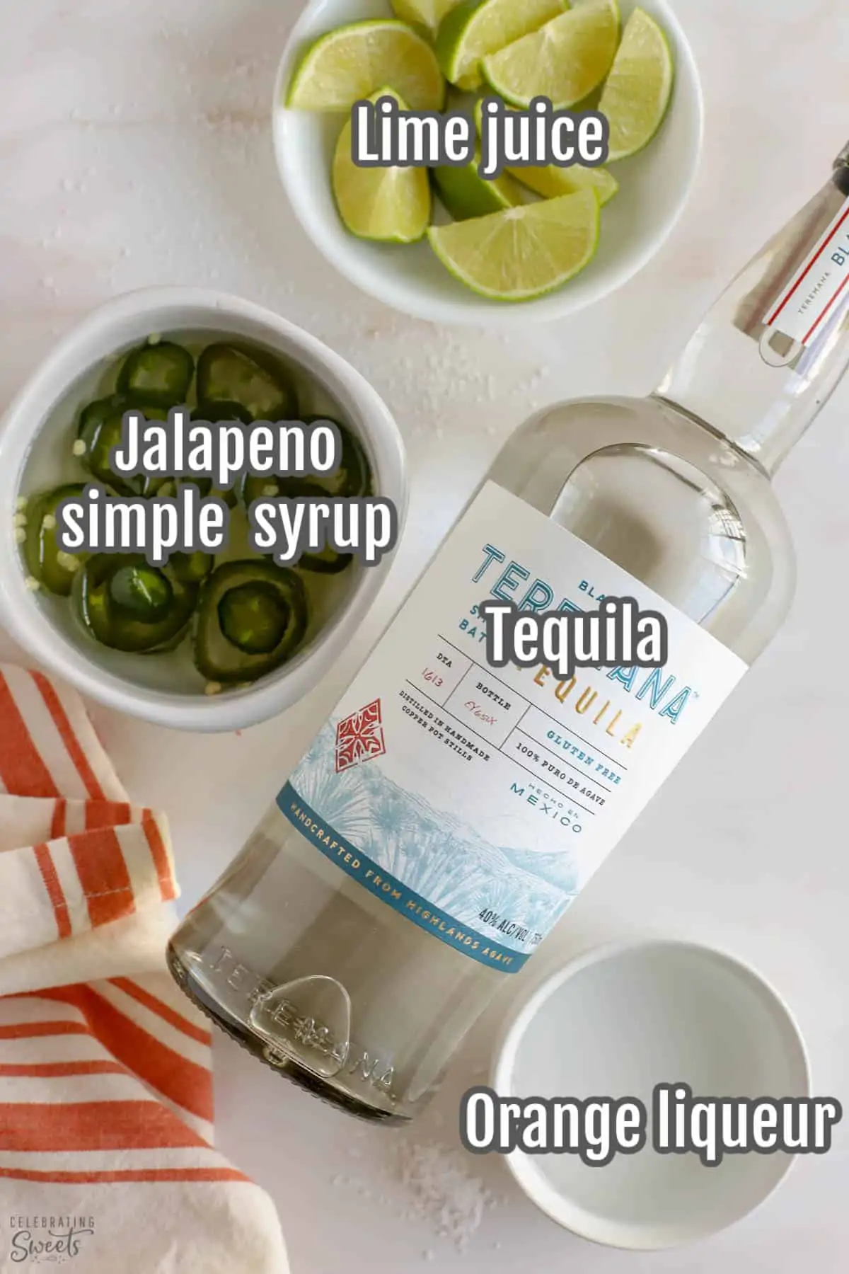 Ingredients for a spicy margarita: tequila, liqueur, limes, jalapeno syrup.