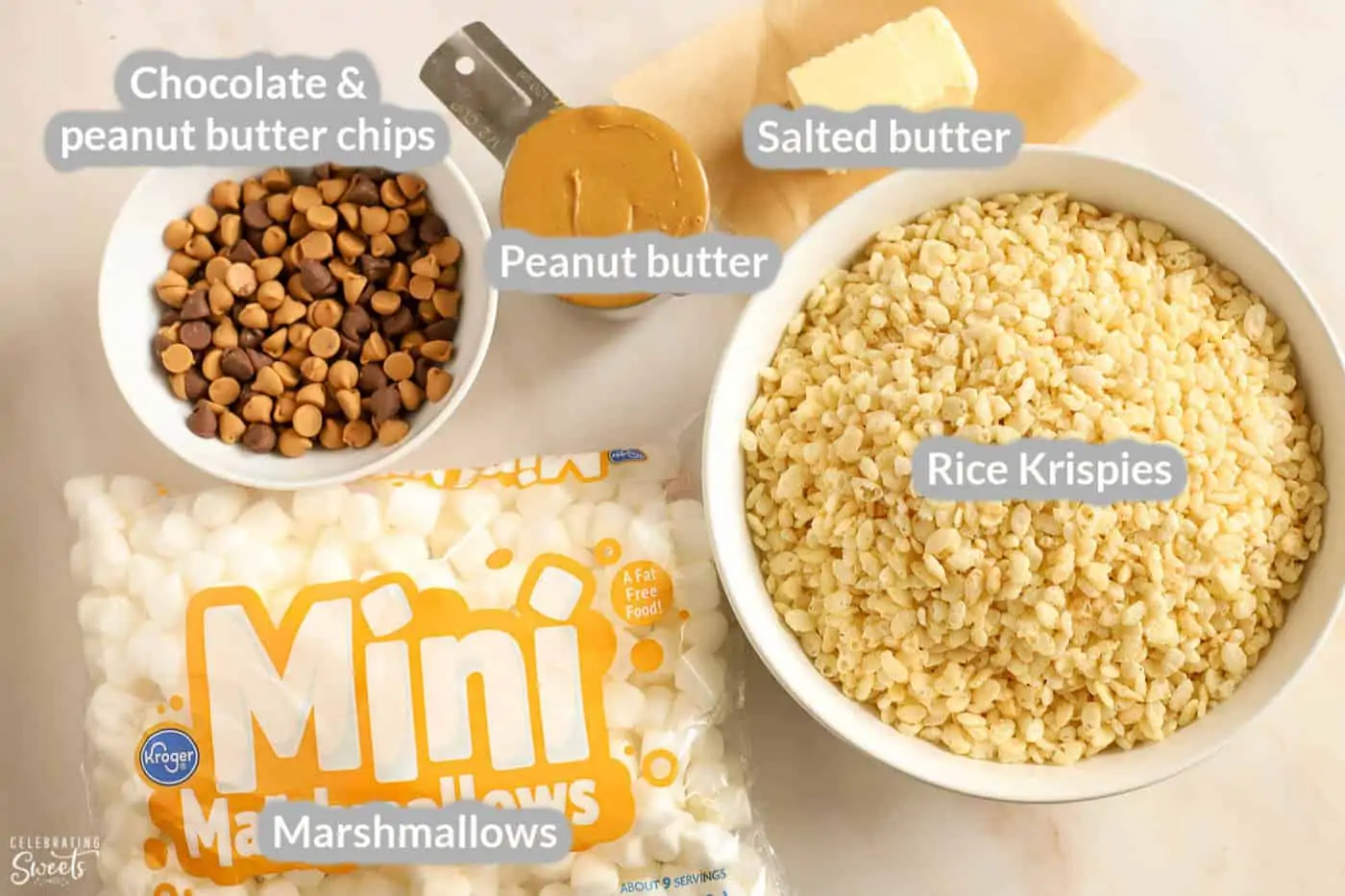 Ingredients for peanut butter rice krispies treats: rice krispies, marshmallows, peanut butter, butter, chocolate chips.
