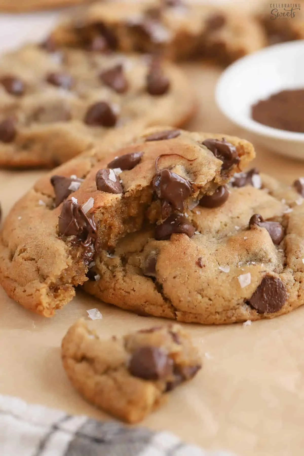 Closeup of espresso chocolate chip cookies on parchment paper.