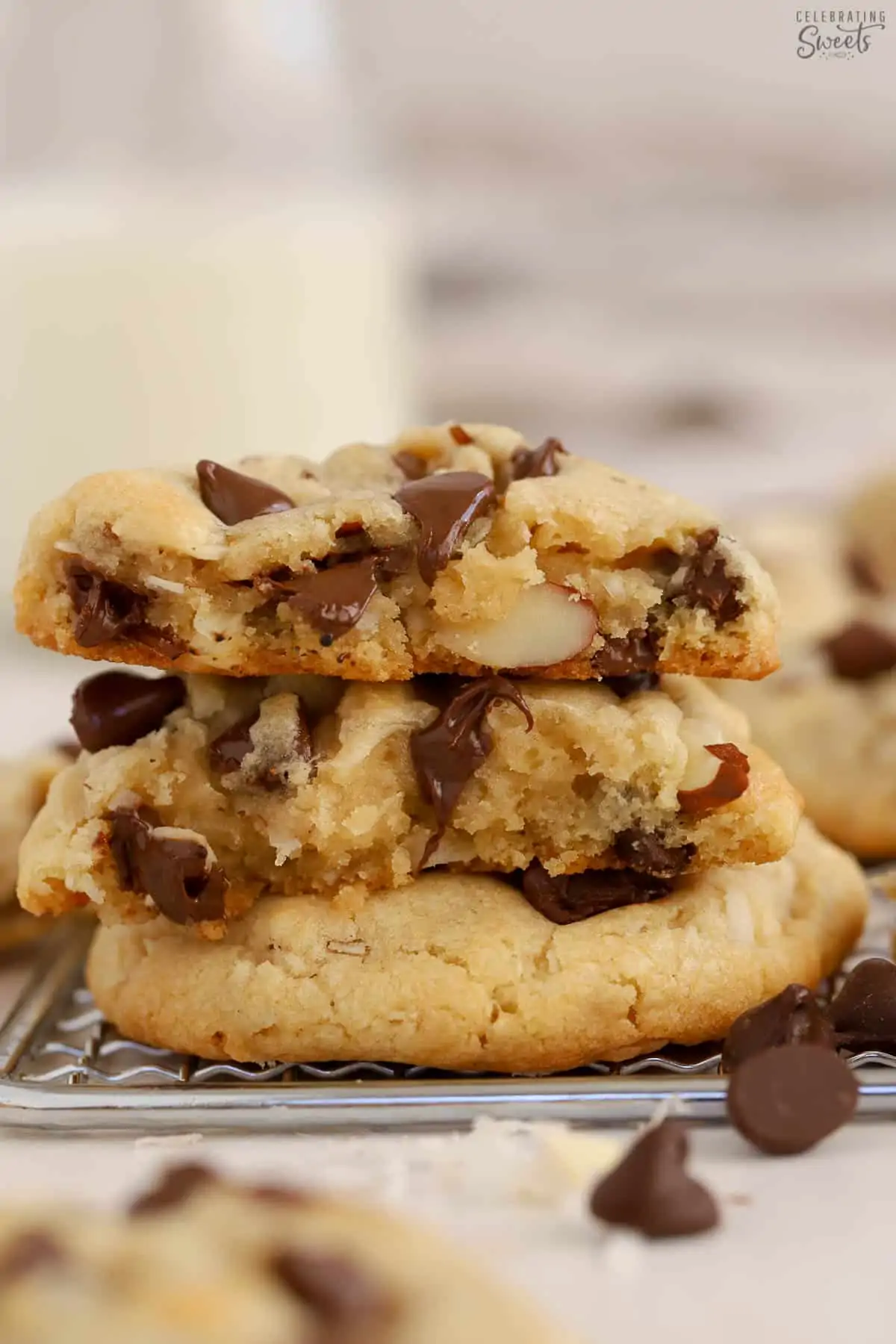 Stack of almond joy cookies on a wire rack.