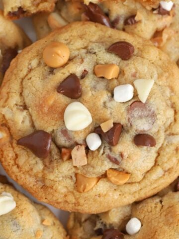 Cookies topped with white chocolate, butterscotch, and chocolate chips.