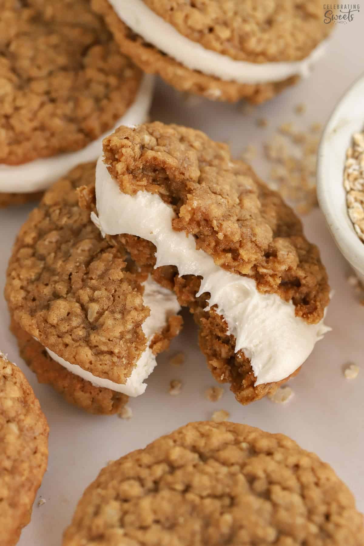 Two pieces of oatmeal cream pie sandwich cookies.