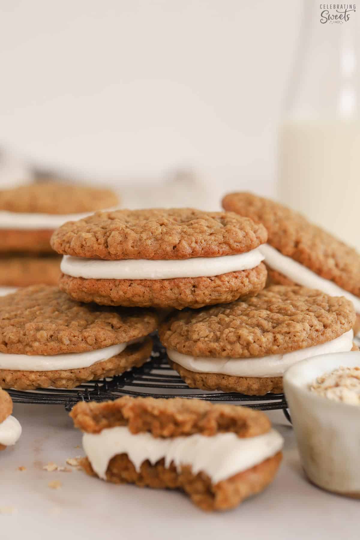 Stack of oatmeal cream pies on a wire rack.