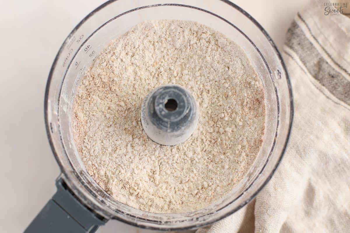 Oats and flour in a food processor.